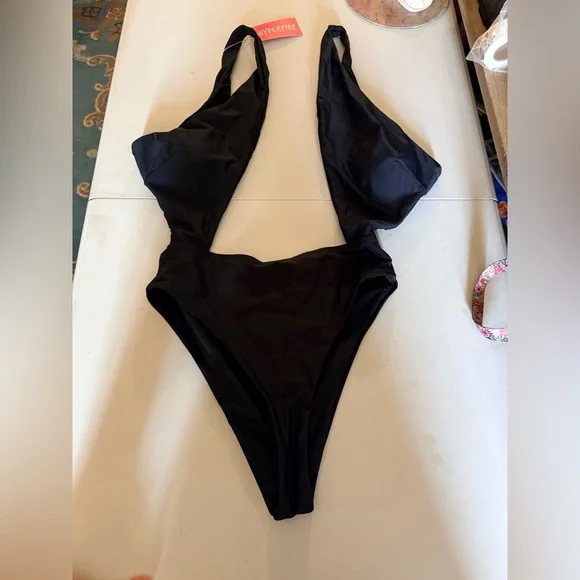 HYPERFIRE Sexy Halter Criss Cross Cut Out One Piece Bathing Suit.
Size M - Picture 6 of 11